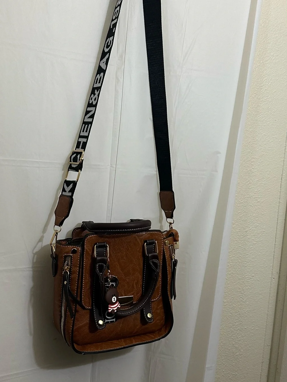 Structured Tan Faux Leather Crossbody Bag with Gold Accents